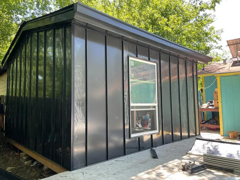 Black standing seam metal wall panels for Metal Roof Installation in Van Buren