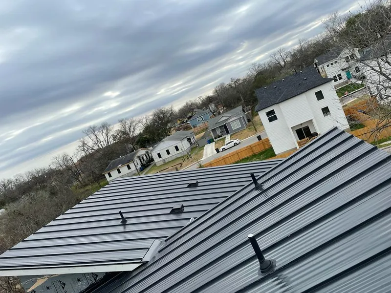 Standing seam metal roof panels with vents for Skylight Repair in Van Buren